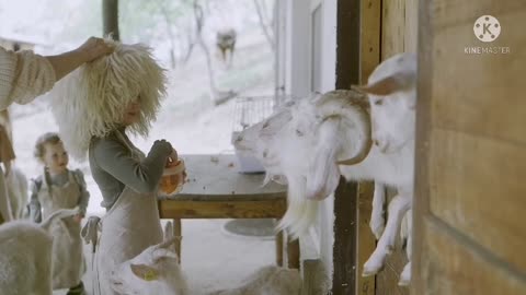 Beautyful girls eting the food a goat