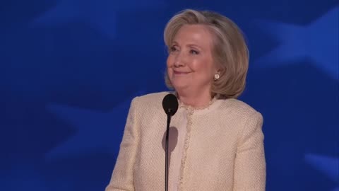 Hillary Clinton gives Evil Smirk as brainwashed crowd chants to lock Trump up