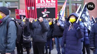 Protestors gathered outside the Canadian Olympic Committee in Toronto to call for a full boycott of the Beijing Olympics