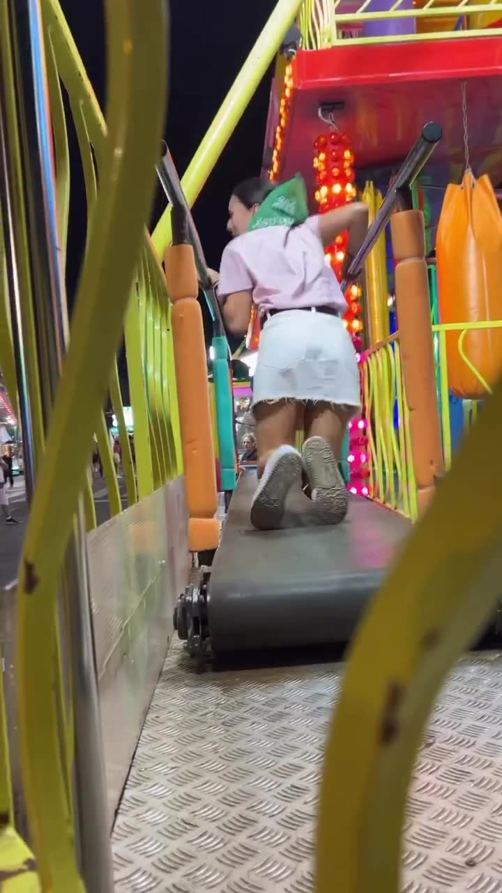 Carnival Ride Hilariously Traps Woman On Moving Walkway