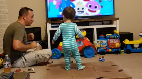 Dad constructs dance floor for baby to dance to 'baby shark'