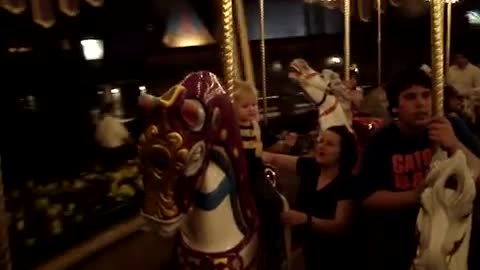 On the carousel in the Magic Kingdom WDW