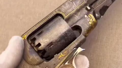 The Space Cowboy. A revolver made from solid meteorite and gold