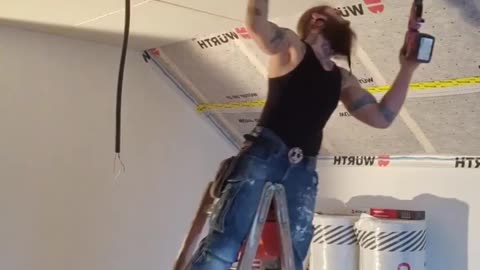 GUY USING LADDER LIKE A NATURAL EXTENSION OF HIS BODY