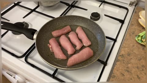 Meat rolls. Meat with mushrooms stewed in sour cream