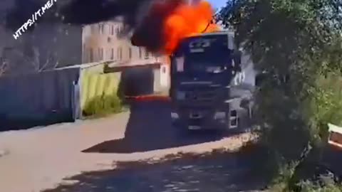 “It’s totally fine,” says the driver evacuating burning ammo from Toropets, russia.