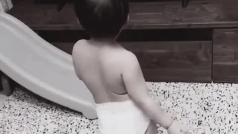 SIMPLY ADORABLE LITTLE DANCING CUTIE MIMICKING WHAT HE SEES ON THE TV SCREEN