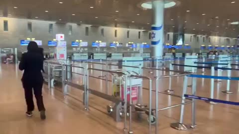 Footage shows empty arrival and departure halls at Israel's Ben-Gurion Airport