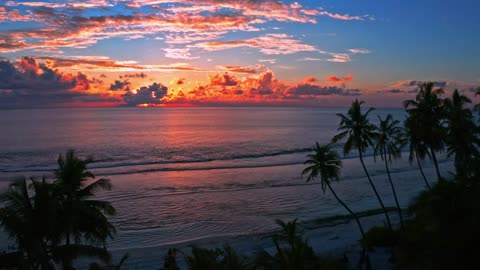 Bright orange sunset on beach