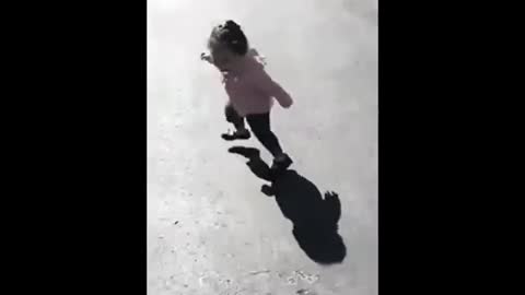 funny baby scared of shadow