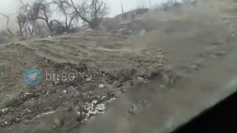 A meeting between a Ukrainian Bandermobile and a Russian tank.