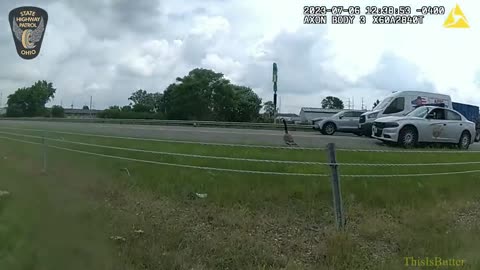 Ohio State Highway Patrol trooper helps geese safely cross I-77 in Stark County