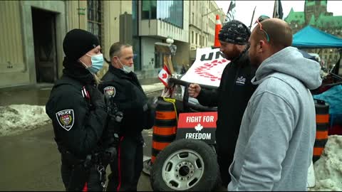 Police officers on Wellington spoke with protestors who have kids with them, offering help through Child Services