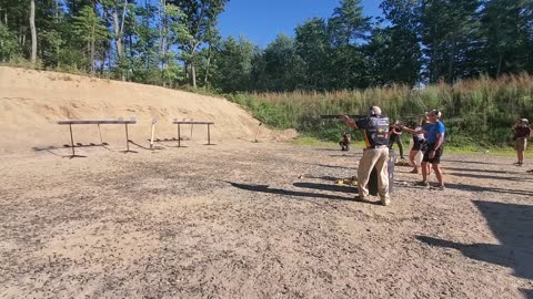 Jerry Miculek vs Lena Miculek shotgun plate rack