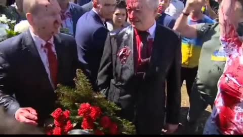 ⁣Russia's ambassador to Poland, Sergey Andreev, ⁣doused with red paint while at a cemetery