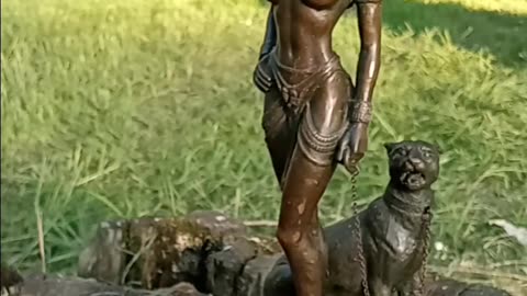 Bronze on marble base Egyptian Goddess with Leopard on a chain