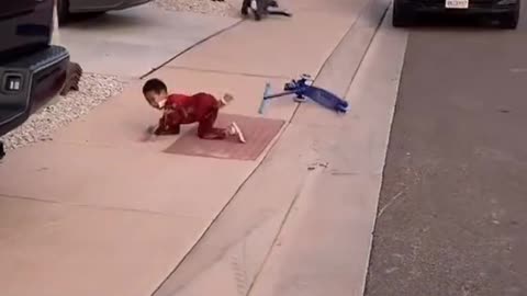 Kids Riding Scooters Wipe Out at the Same Time