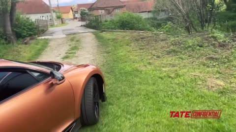 Tate Driving His BUGATTI Through A VILLAGE