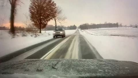 Passing on Icy Road Results in Rollover