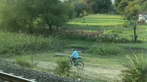 Traveling video, window side view of Indian Train