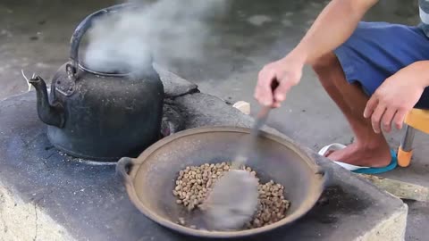 Making kopi luwak coffee. Bali.