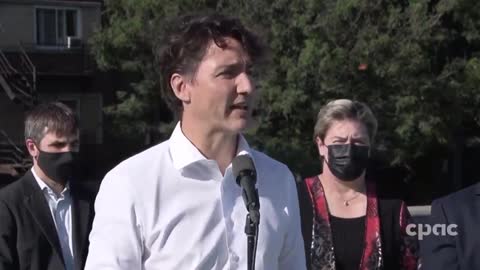 Trudeau addressing people at political rally