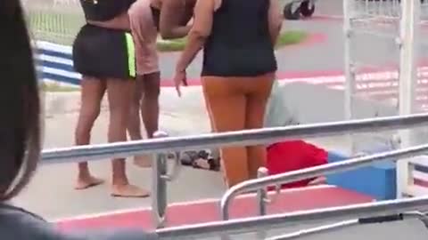 Mothers in Brazil beat the sht out of a man-lady who flashed his junk to their daughter