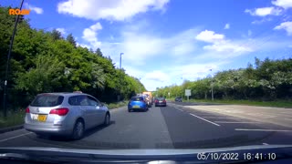 Taxi Swerves Through Traffic