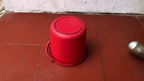 Oil the red bucket first and guess what it's doing