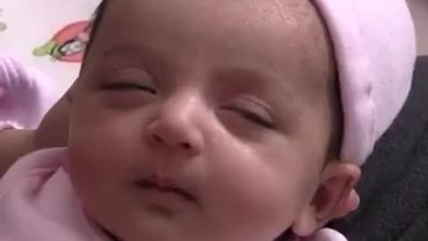 Watch this cute baby try to sleep