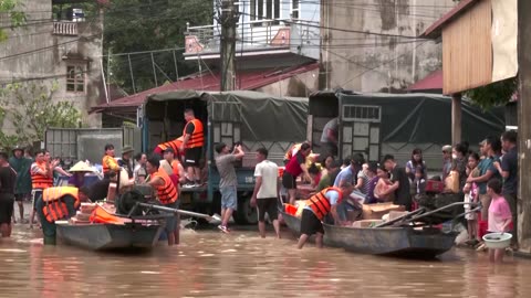 Residents evacuate in the aftermath of Typhoon Yagi in Vietnam