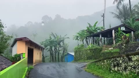 Heavy rain in a beautiful Indonesian Village| captivating and serene scene.