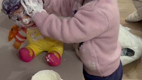 Toddler and Her Doll Get Covered in Cream