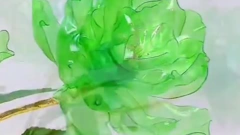 conjuring used plastic bottles into decorative flowers