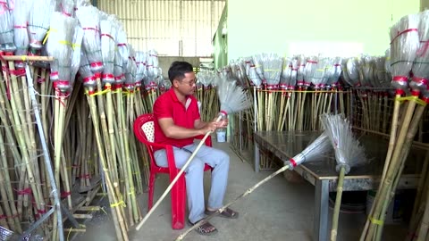 Spinning plastic bottles into brooms in Cambodia