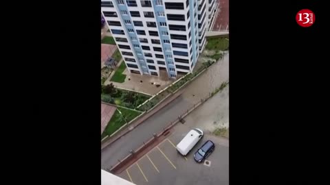 Flood waters enter apartment building, pour down from second-floor balcony in Ankara