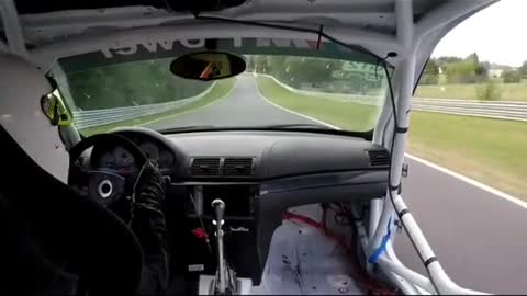 The first perspective of racing drivers driving racing cars is displayed.