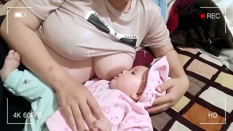 Breastfeeding Mom for her baby