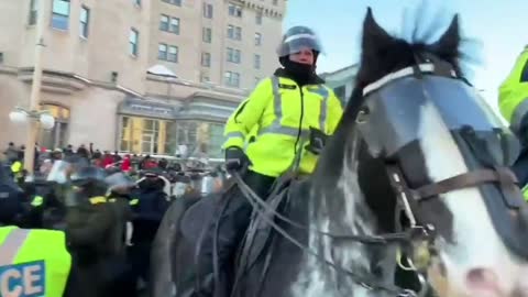 Ottawa, Canada - Trudeau's police uses horses to attack peaceful men and women