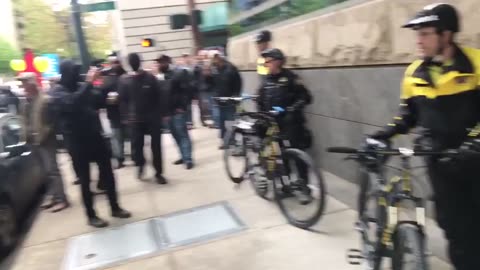 May 1 2017 Portland may day 1.4 Window smashed behind federal courthouse