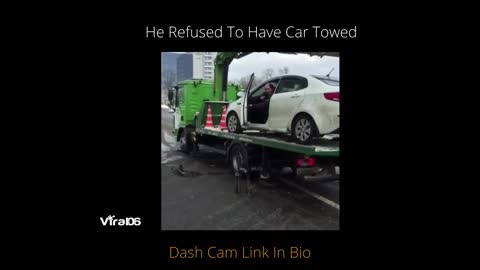 Russian Man Refuses To Have His Car Towed