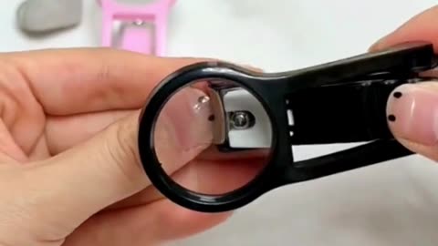 Modern and elegant nails cutter with concave lens for better detailed view