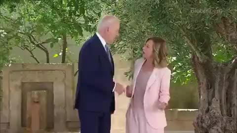 Biden awkwardly salutes Italy's PM Giorgia Meloni as he arrives at G7 Summit