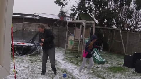 Daughter Throws Snowball With Hidden Stone inside "Just misses Dads Head!"