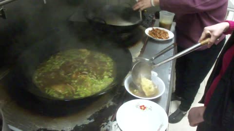 Luodong Eats Ginger Rice Soup In Restaurant Kitchen