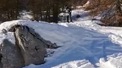 Guy black outfit ski fail slow motion