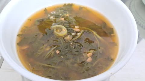 Soy bean paste soup with mugwort herbs.