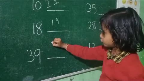 Child teaching to her friends