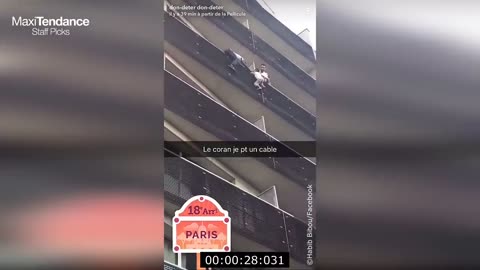 Hero Climbs Up Building to Rescue Baby Hanging from a Balcony in Paris France