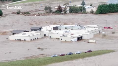 Drone video of patients waiting to be rescued from hospital roof in Tennessee from Hurricane Helene